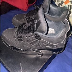 Black cat 4s lightly worn.